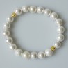 Bracelet with pearls and golden squares