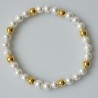 Bracelet with pearls and golden balls