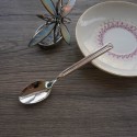 Spoon with tulip symbol