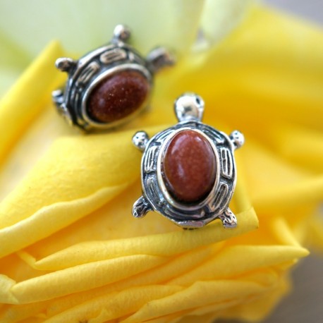 silver turtle earrings with sunstone stone.