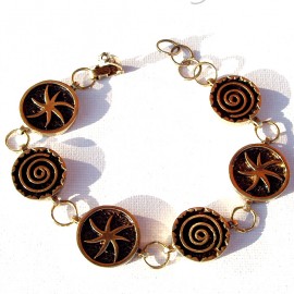Bronze bracelet with circles with symbols of the Universe