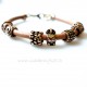 Bronze bracelet with gold colored beads R7-2